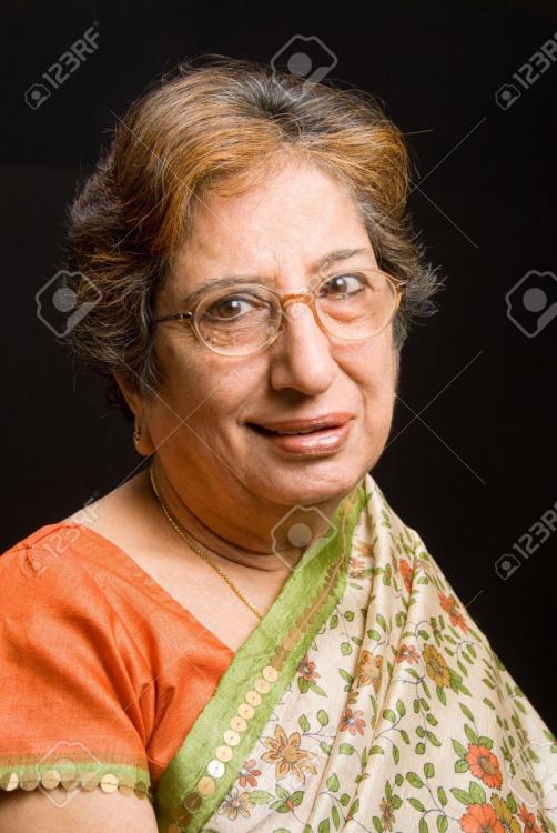 5891558-A-senior-East-Indian-woman-wearing-a-sari-Stock-Photo-old.jpg