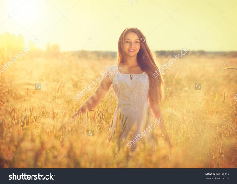 stock-photo-beauty-girl-outdoors-enjoying-nature-beautiful-teenage-model-girl-in-white-dress-running-on-the-203179315.jpg