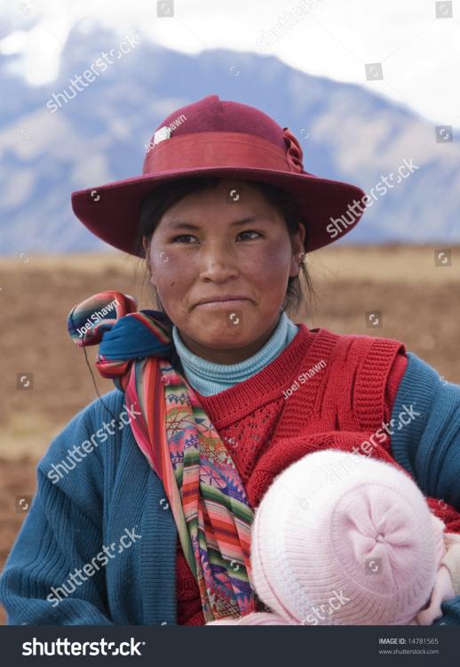 stock-photo-peru-august-a-native-peruvian-women-smiles-as-she-demonstrates-how-to-wrap-and-carry-a-child-14781565.jpg